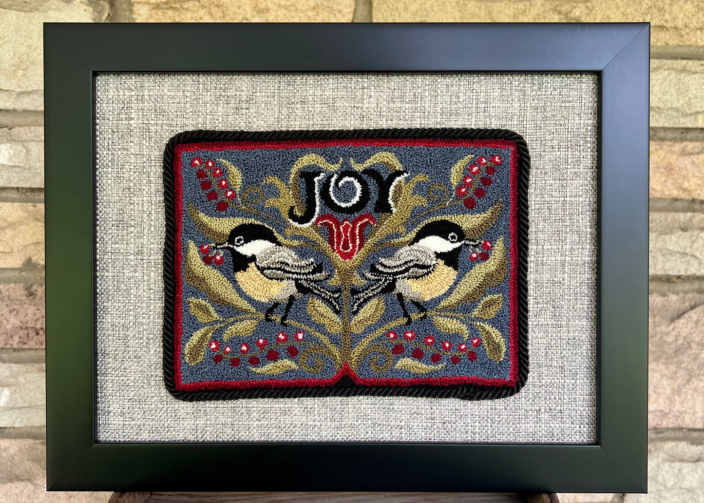 Chickadee Joy punch needle pattern featuring two chickadees and winter berries