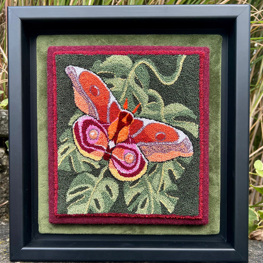 Introducing The Bullseye Moth- Needle Punch Pattern with a custom DMC thread kit. This mesmerizing and elegant design was inspired by the intricate patterns found in nature. This needle punch pattern features a stunning depiction of a moth with wide wings, showcasing the delicate bullseye markings that give this moth its unique name. Pattern by Orphaned Wool Copyright 2023 Kelly Kanyok