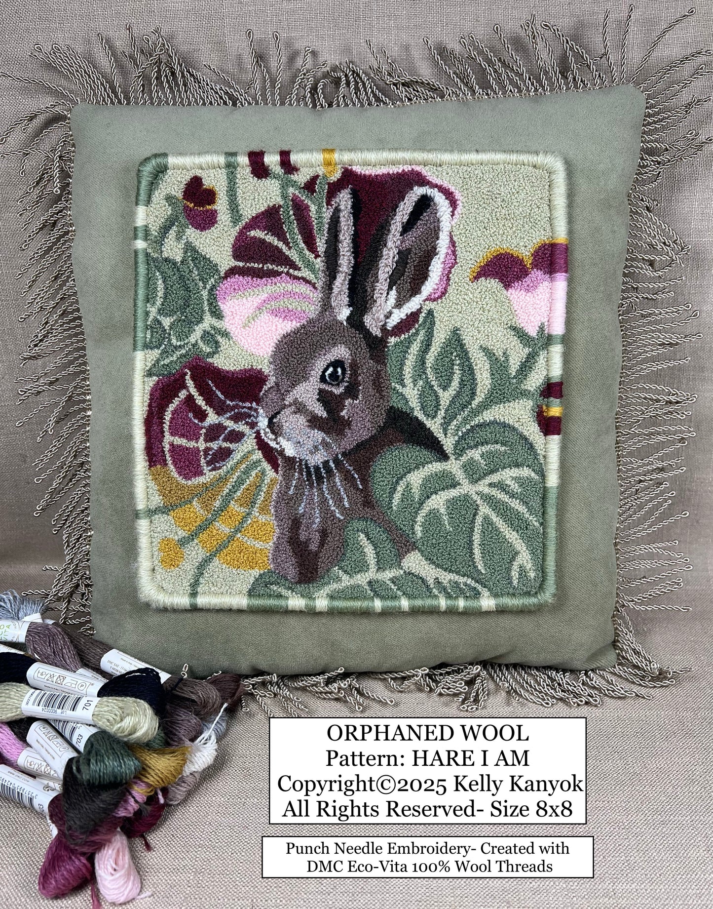 Hare I Am punch needle pattern by Orphaned Wool, copyright 2025 Kelly Kanyok. This is a wonderful bunny pattern with flowers and leaves surrounding him.