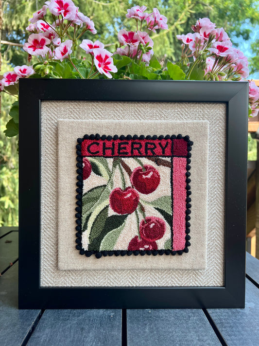 Cherry - PDF Punch Needle Digital Download Pattern by Orphaned Wool, Copyright 2025 Kelly Kanyok. This pattern features a cluster of cherries hanging from a vine with the word "CHERRY" at the top. Note: Each pattern is sold separately.