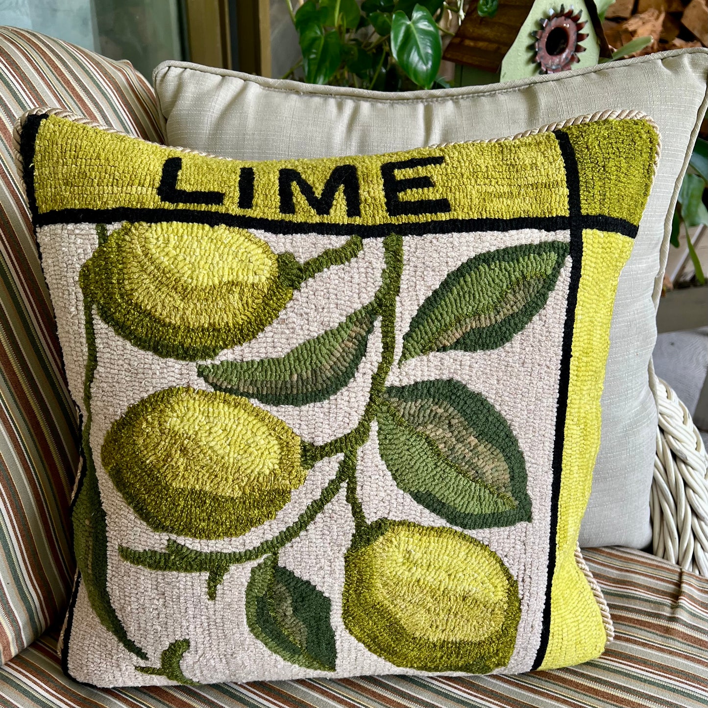 Featuring the Lime design rug hooked pillow by Orphaned Wool copyright Kelly Kanyok 2025.