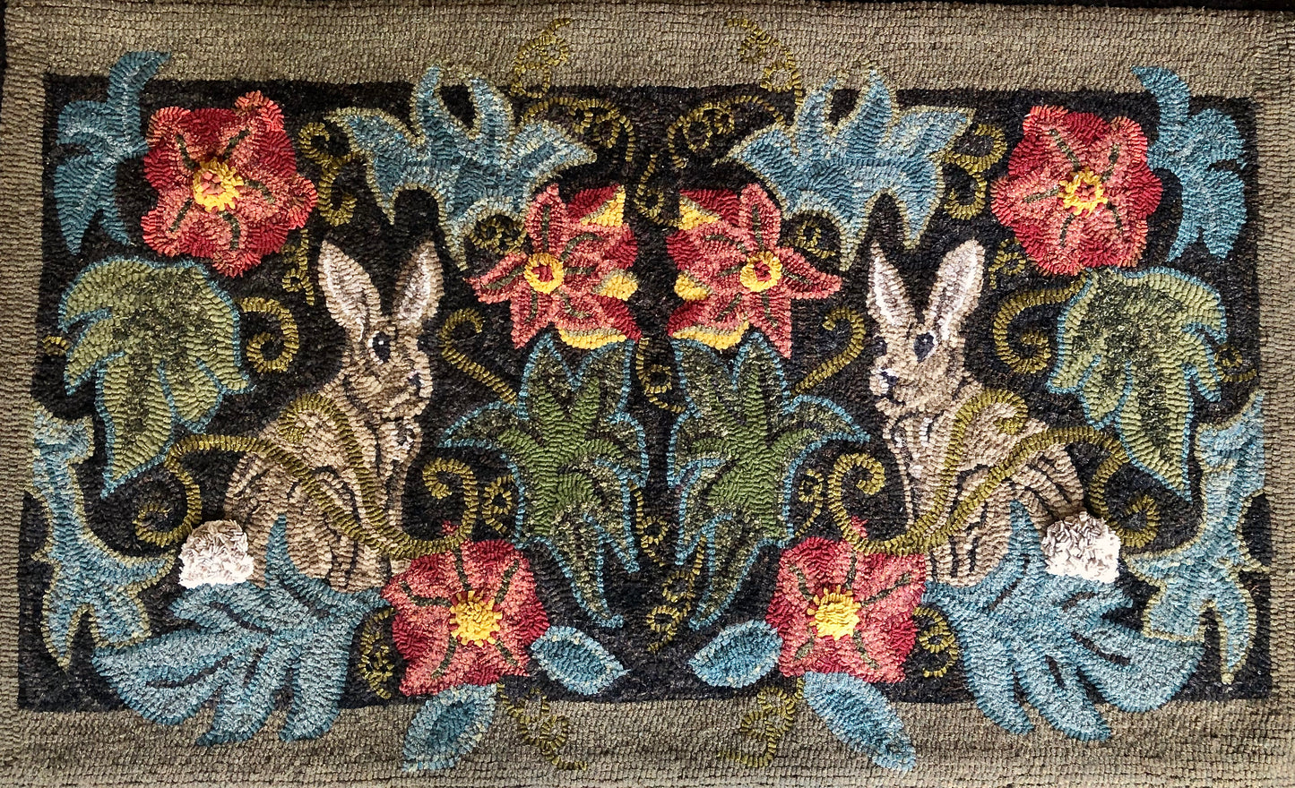 Rabbits in the Garden- Rug Hooking or Rug Punch Needle Pattern by Orphaned Wool. This design is hand-drawn of natural Linen. Enjoy these sweet bunnies facing each other with flowers and foliage.
