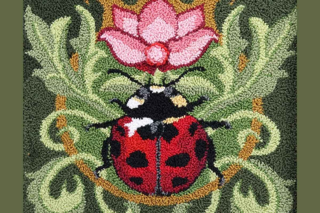 "Close-up of punch needle loops on a ladybug pattern - Orphaned Wool troubleshooting guide"