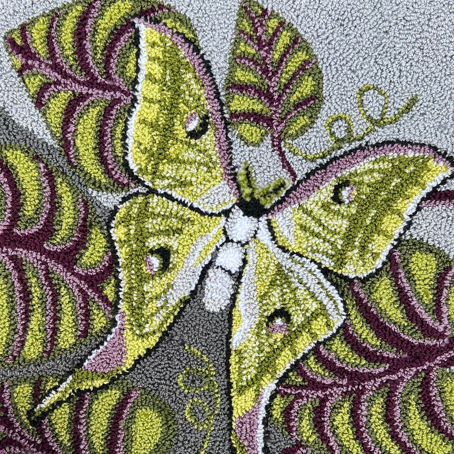 Luna Moth Needle Punch Pattern with custom thread kit by Orphaned Wool, Copyright © 2023 Kelly Kanyok. This pattern of a Luna Moth within the leaves is available as a Paper or Cloth pattern.