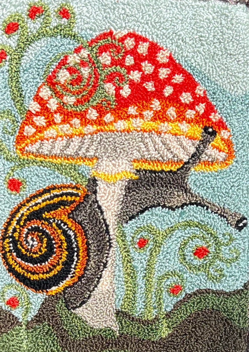  Presenting the enchanting "ENTWINED" Paper Rug Hooking Pattern by Orphaned Wool. This delightful design showcases a charming snail gracefully wrapping around a vibrant mushroom. This fabulous paper pattern offers you the opportunity to bring the wonders of nature to life and create the perfect size pattern you desire. The Entwined pattern is copyrighted 2024 Kelly Kanyok, Orphaned Wool.