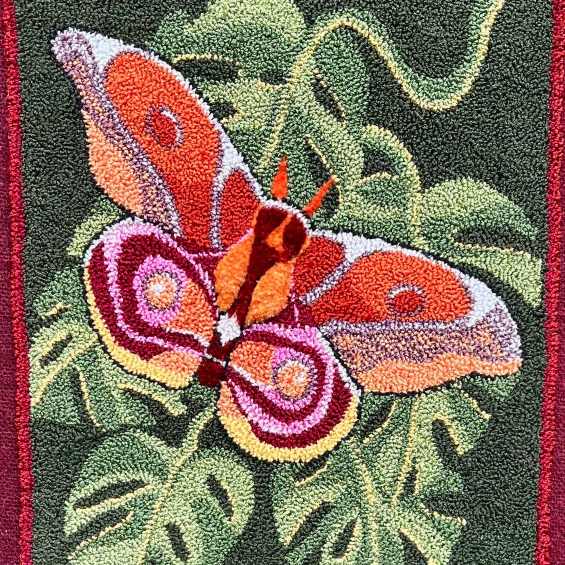  Bullseye Moth- Needle Punch Pattern by Orphaned Wool, Copyright © 2023 Kelly Kanyok. This design of a Bullseye Moth from Madagascar with extended wings pattern is available as a Paper Pattern or a Pattern Printed on Cloth. This a a beautiful nature-inspired design you will love to create.