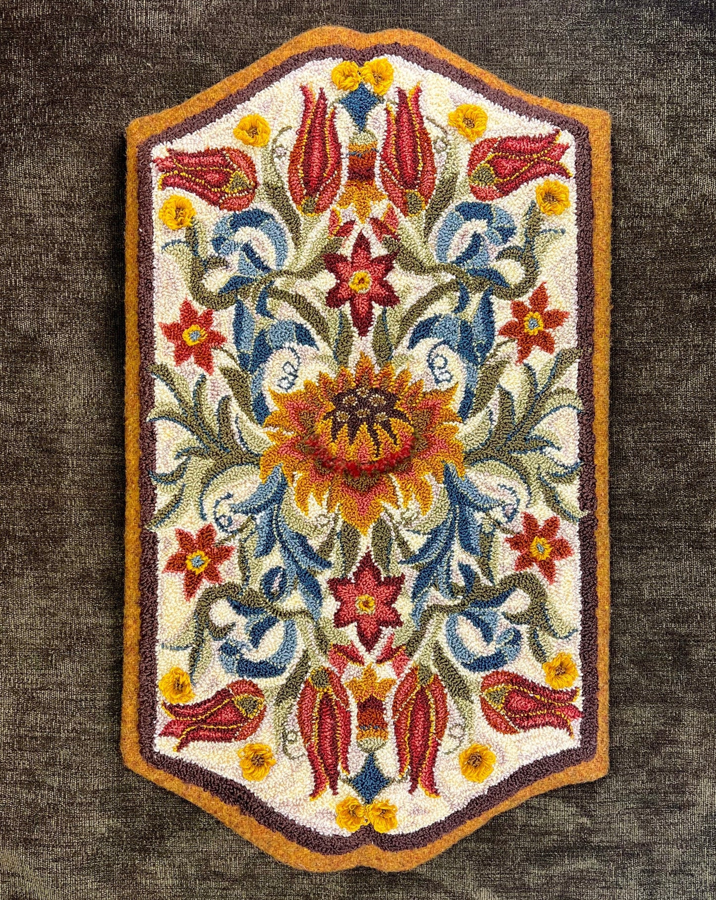  Delight- Paper Rug Hooking or Rug Punch Needle Pattern by Orphaned Wool. This is a timeless floral design inspired by the Arts and Crafts movement. The curved edges create an elegance to the design. This is a paper pattern that is formatted to be enlarged. You can choose what size Delight pattern you wish to create with this paper pattern. Copyright 2022- Kelly Kanyok / Orphaned Wool.