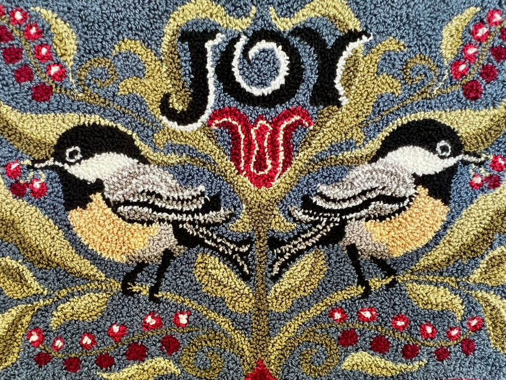 Chickadee Joy rug hooking pattern featuring two chickadees, winter berries, and the word Joy