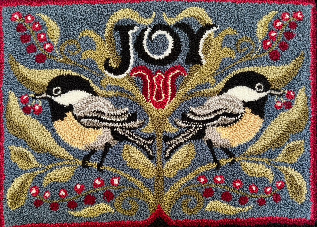 Chickadee Joy rug hooking pattern featuring two chickadees, winter berries, and the word Joy