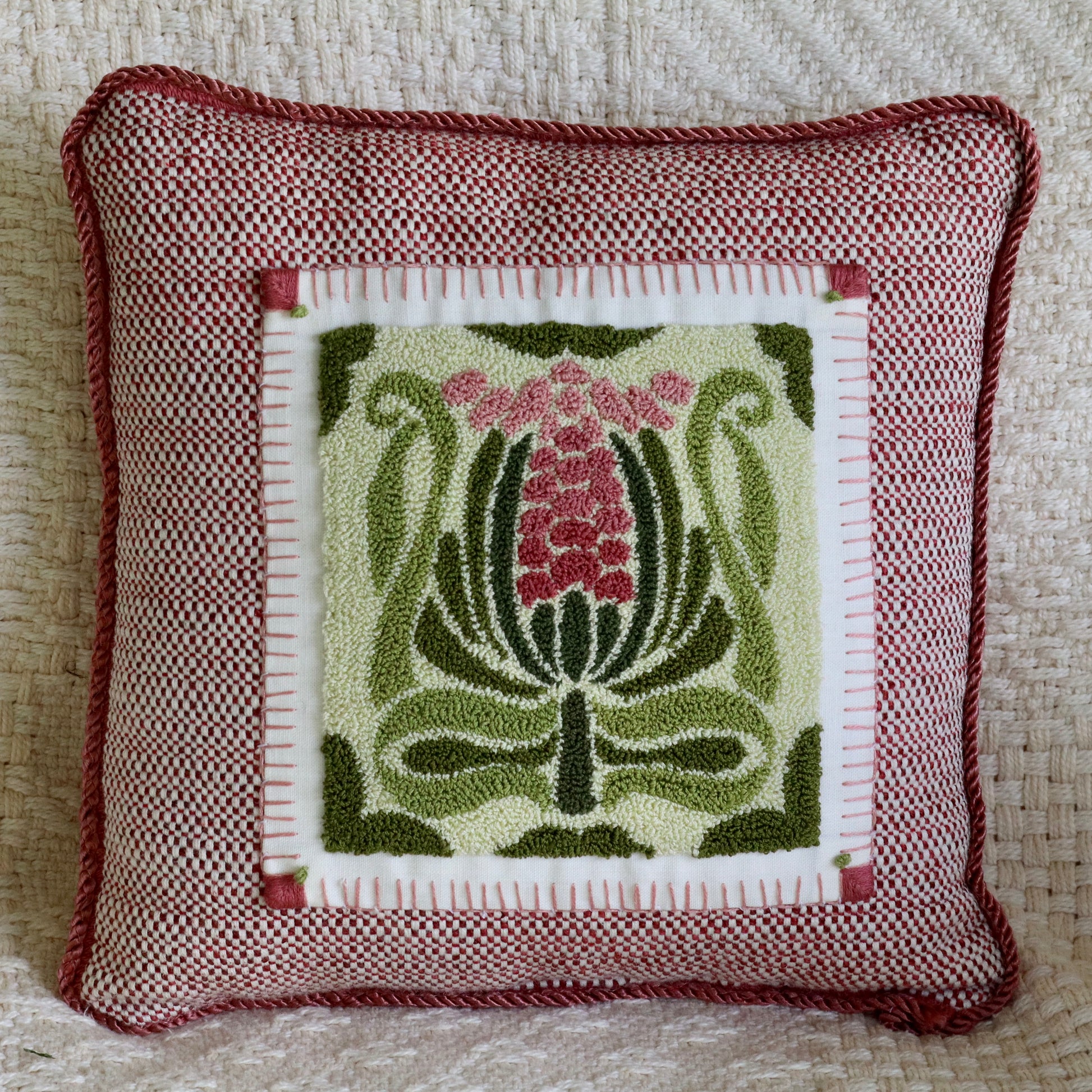 Deco Bloom is a geometric, Art Deco-inspired floral design pattern from Orphaned Wool designed for fiber artist
