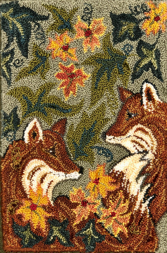 Rug with foxes and floral patterns