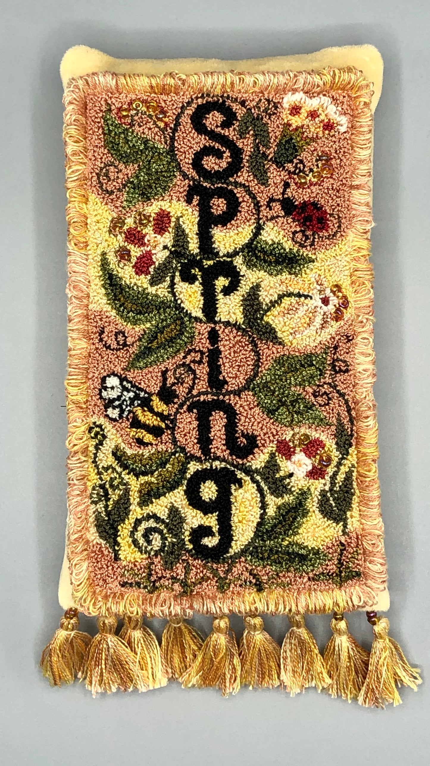 Spring Vine- PDF punch needle pattern digital download by Orphaned Wool. This lovely Spring Vine has a sweet bumblebee and ladybug and flowers all in the pattern. Copyright 2020 Kelly Kanyok , Orphaned Wool. Enjoy creating this beautiful Spring Vine design.