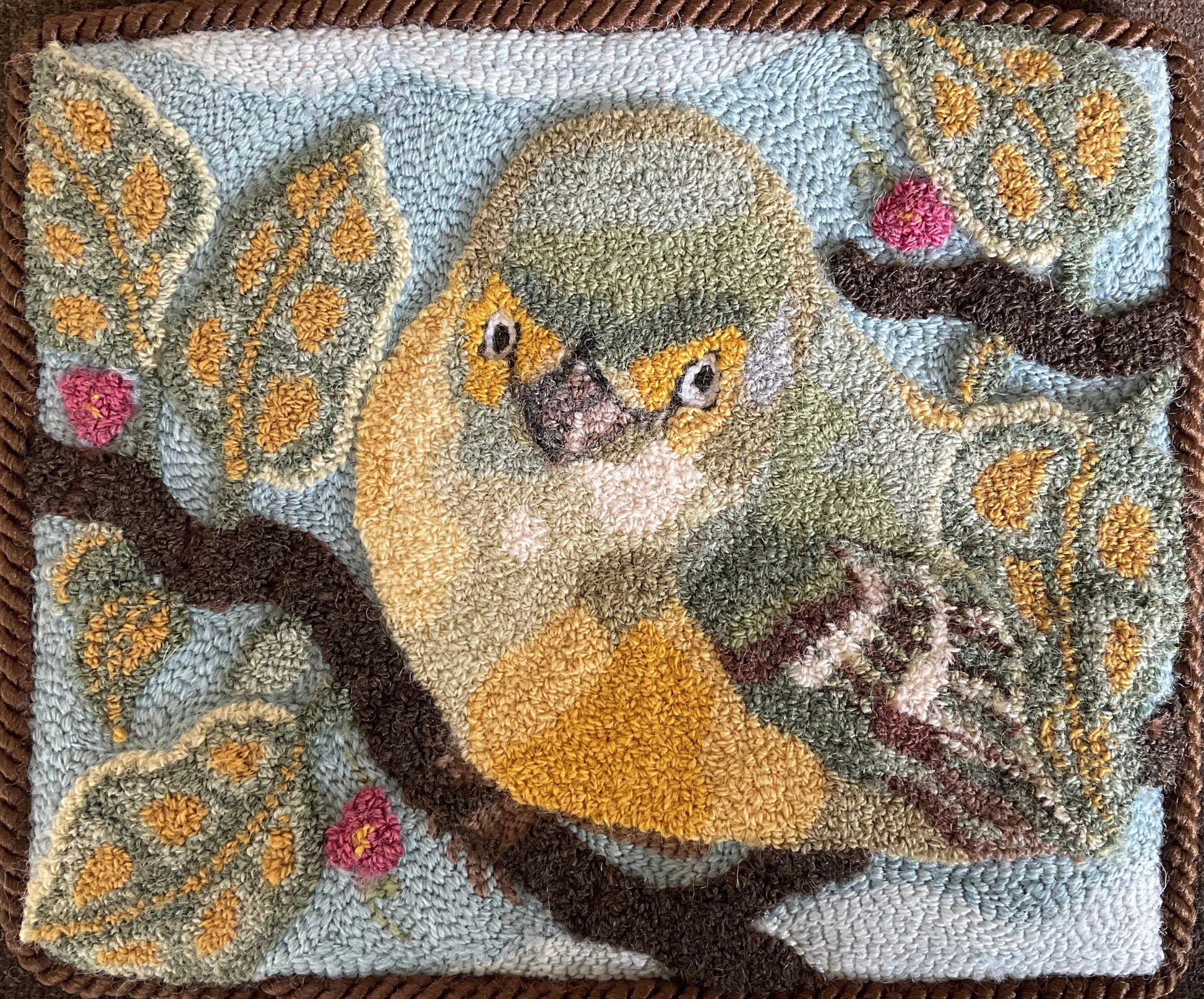 White-Eyed Vireo Bird Paper Rug Hooking pattern by Orphaned Wool, copyright 2024 Kelly Kanyok. This pattern was designed for enlargement  ad freatures a White-Eyed Vireo Bird resting amongst the branches. Pattern provides enlargement size suggestions and instructions.