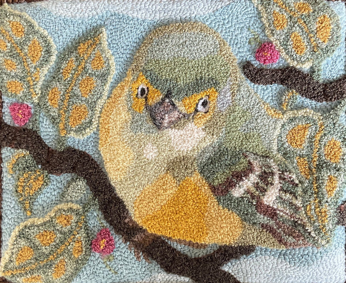 White-Eyed Vireo Bird Paper Rug Hooking pattern by Orphaned Wool, copyright 2024 Kelly Kanyok. This pattern was designed for enlargement  ad freatures a White-Eyed Vireo Bird resting amongst the branches. Pattern provides enlargement size suggestions and instructions.