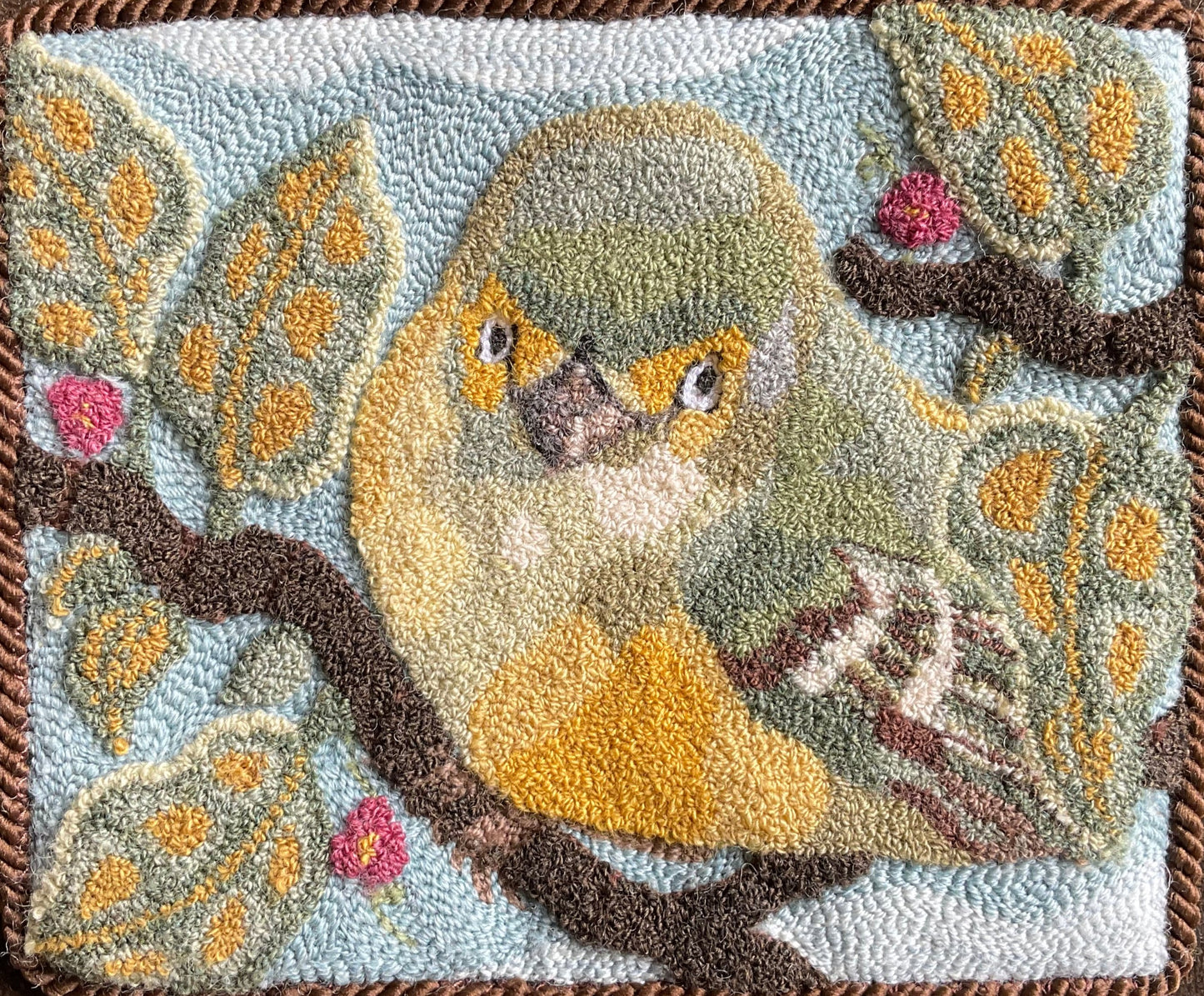 White-Eyed Vireo Bird Paper Rug Hooking pattern by Orphaned Wool, copyright 2024 Kelly Kanyok. This pattern was designed for enlargement  ad freatures a White-Eyed Vireo Bird resting amongst the branches. Pattern provides enlargement size suggestions and instructions.