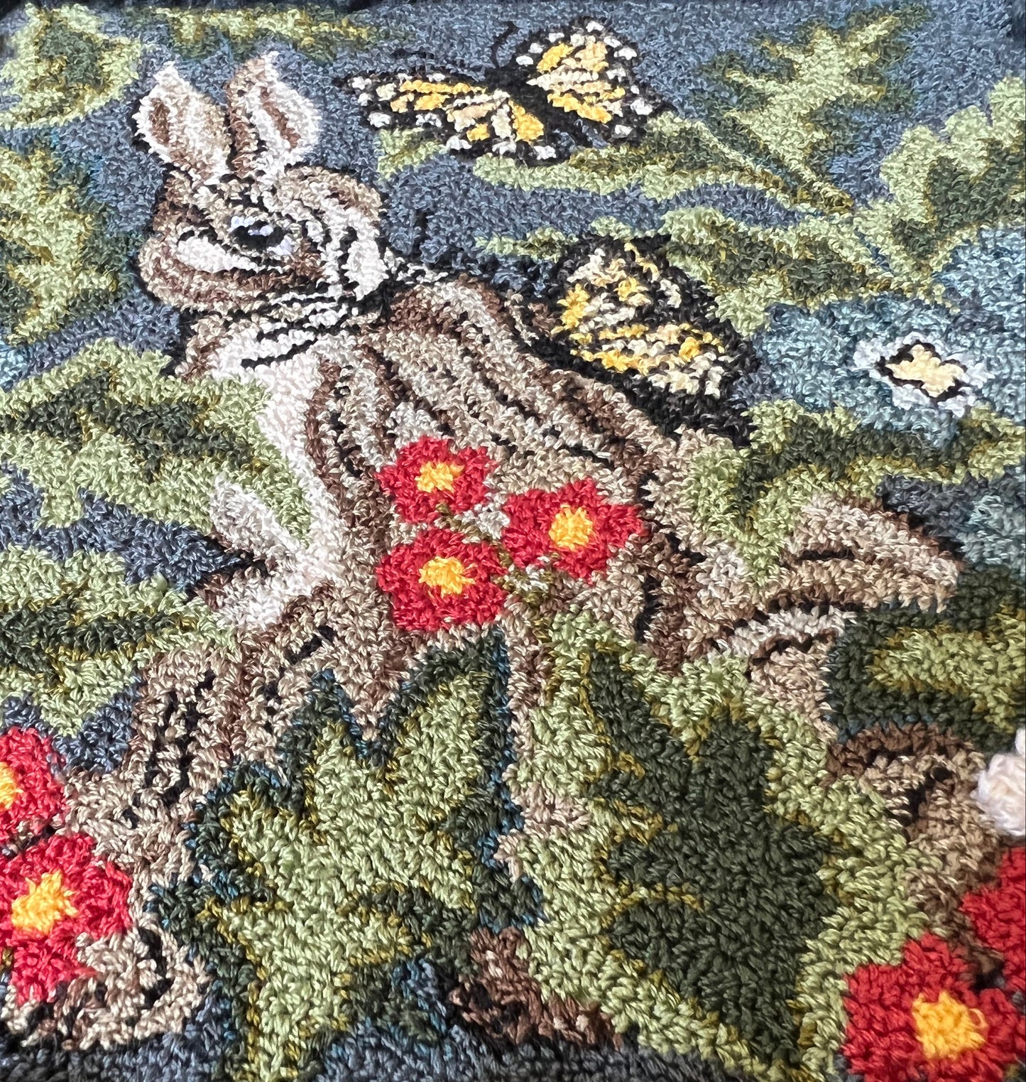 Hare with Friends Paper Rug Hooking or Oxford Rug Punch Needle Pattern by Orphaned Wool. This beautiful pattern with butterflies and a sweet bunny with flowers and foliage makes a wonderful finished rug or wall hanging.