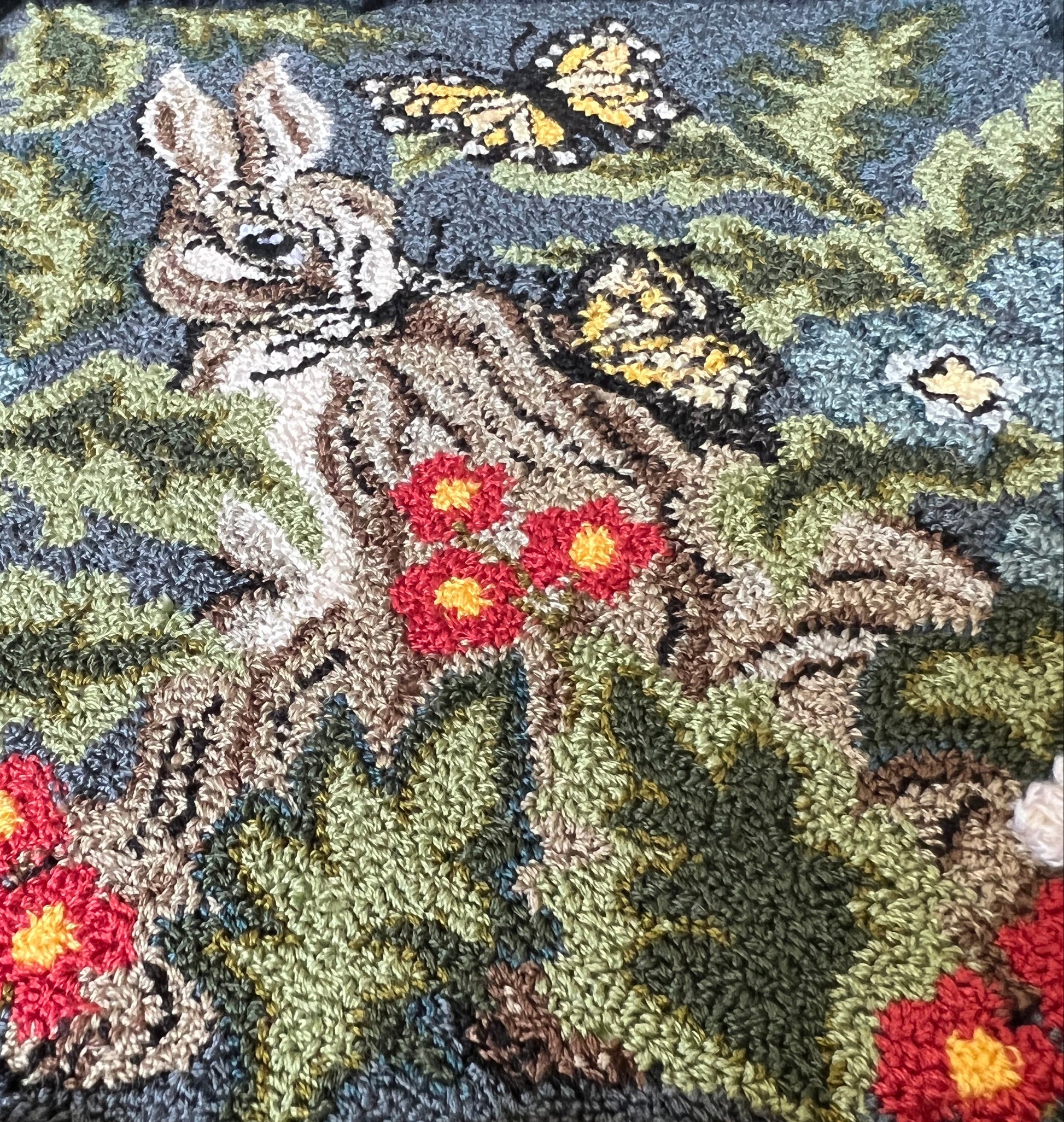 Hare with Friends Paper Rug Hooking or Oxford Rug Punch Needle Pattern by Orphaned Wool. This beautiful pattern with butterflies and a sweet bunny with flowers and foliage makes a wonderful finished rug or wall hanging.