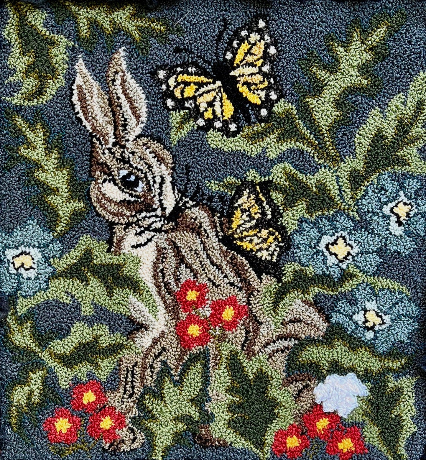 Hare with Friends Paper Rug Hooking or Oxford Rug Punch Needle Pattern by Orphaned Wool. This beautiful pattern with butterflies and a sweet bunny with flowers and foliage makes a wonderful finished rug or wall hanging.