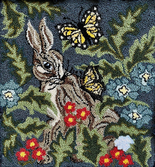 Hare with Friends Paper Rug Hooking or Oxford Rug Punch Needle Pattern by Orphaned Wool. This beautiful pattern with butterflies and a sweet bunny with flowers and foliage makes a wonderful finished rug or wall hanging.