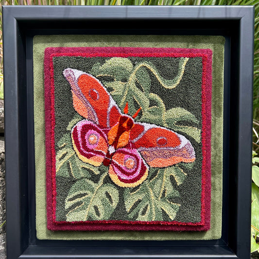  Introducing The Bullseye Moth- Needle Punch Pattern with a custom DMC thread kit. This mesmerizing and elegant design was inspired by the intricate patterns found in nature. This needle punch pattern features a stunning depiction of a moth with wide wings, showcasing the delicate bullseye markings that give this moth its unique name. Pattern by Orphaned Wool Copyright 2023 Kelly Kanyok