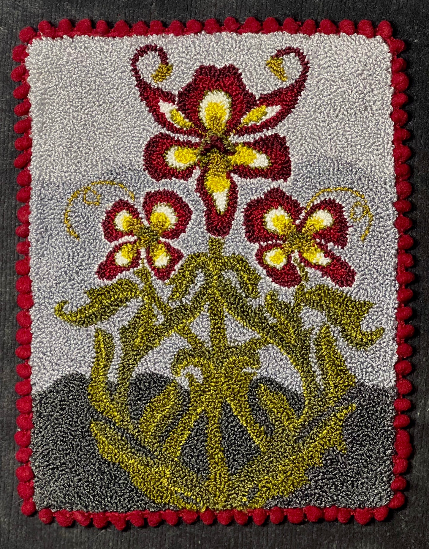 Punch Needle Embroidery Pattern- Ruby by Orphaned Wool, copyright 2024 Kelly Kanyok. This is the Winter design in a four-part series of floral seasonal designs. 