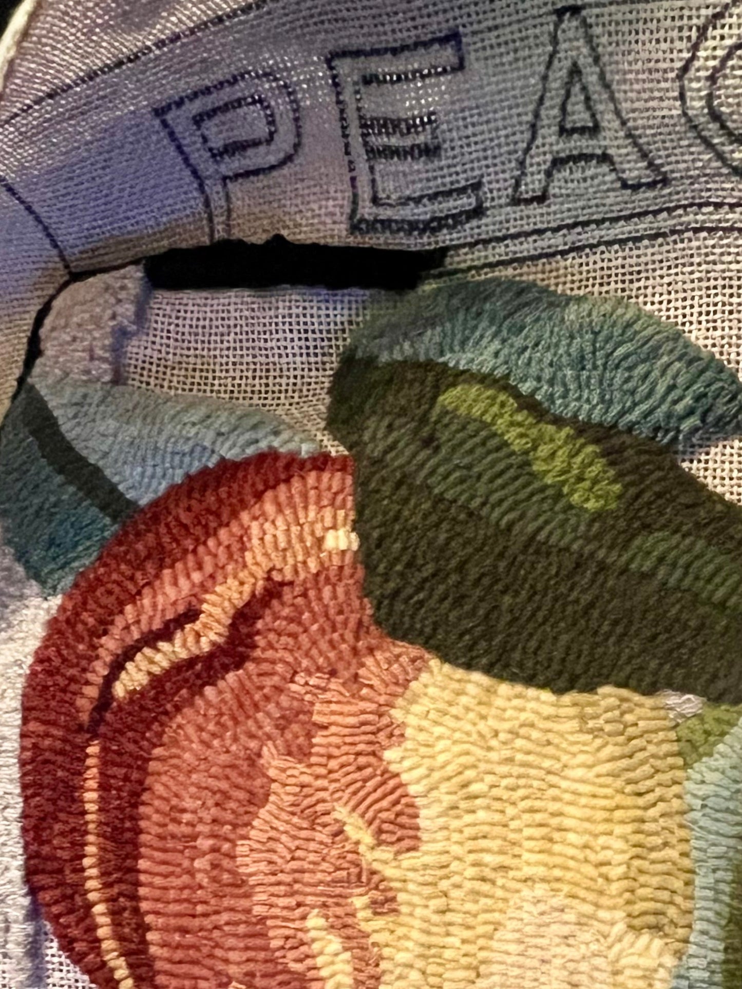 Peach Rug Hooking Pattern by Orphaned Wool, copyright 2025, Kelly Kanyok, hand-drawn on natural linen, 16 1/2 x 16 1/2. 