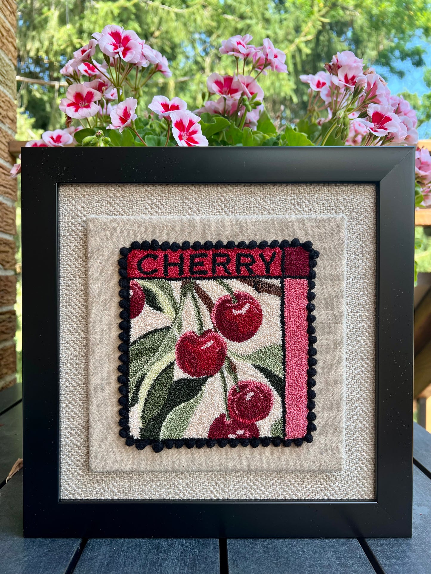 Cherry - PDF Punch Needle Digital Download Pattern by Orphaned Wool, Copyright 2025 Kelly Kanyok. This pattern features a cluster of cherries hanging from a vine with the word "CHERRY" at the top. Note: Each pattern is sold separately.