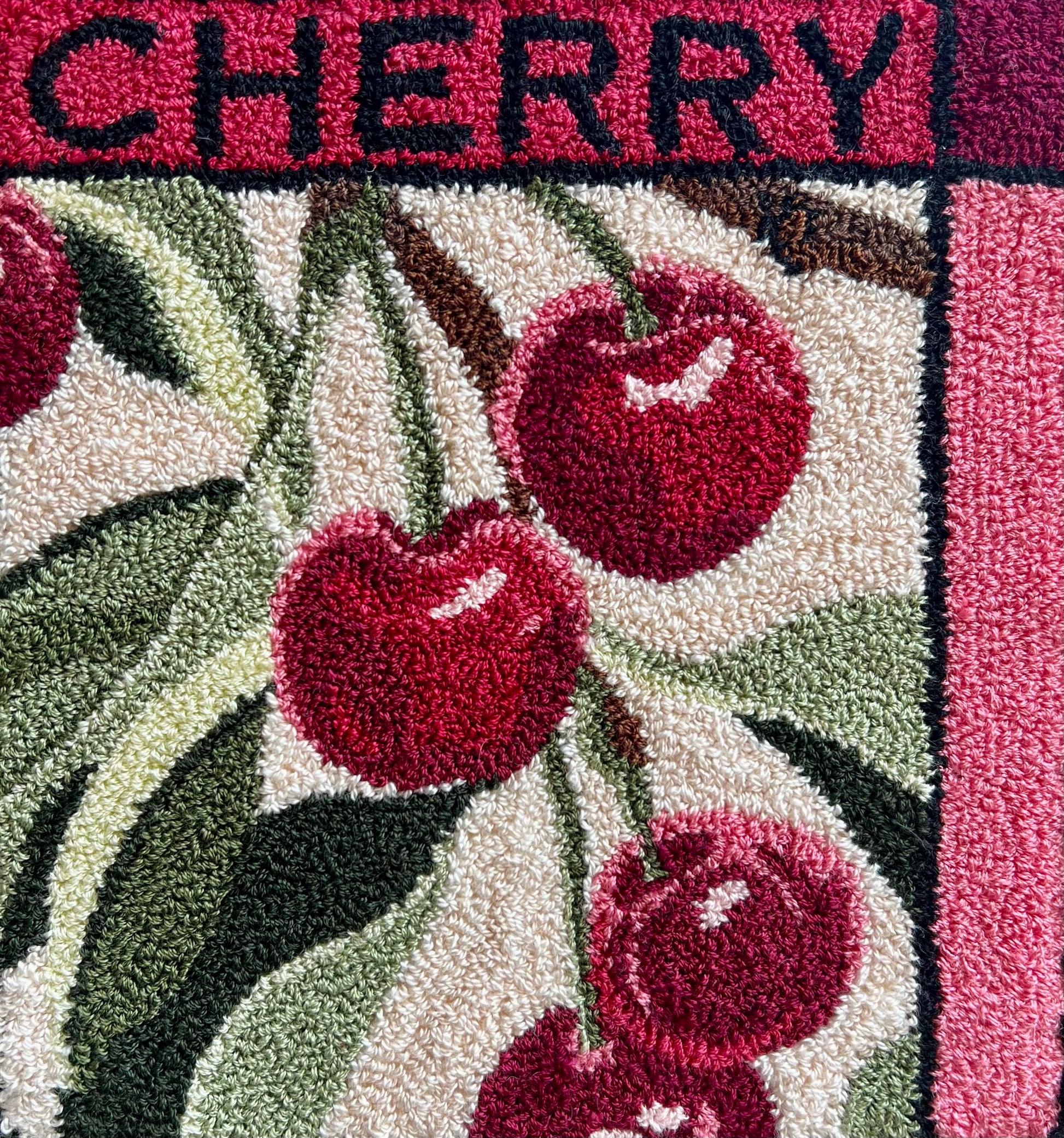 Cherry - PDF Punch Needle Digital Download Pattern by Orphaned Wool, Copyright 2025 Kelly Kanyok. This pattern features a cluster of cherries hanging from a vine with the word "CHERRY" at the top. 