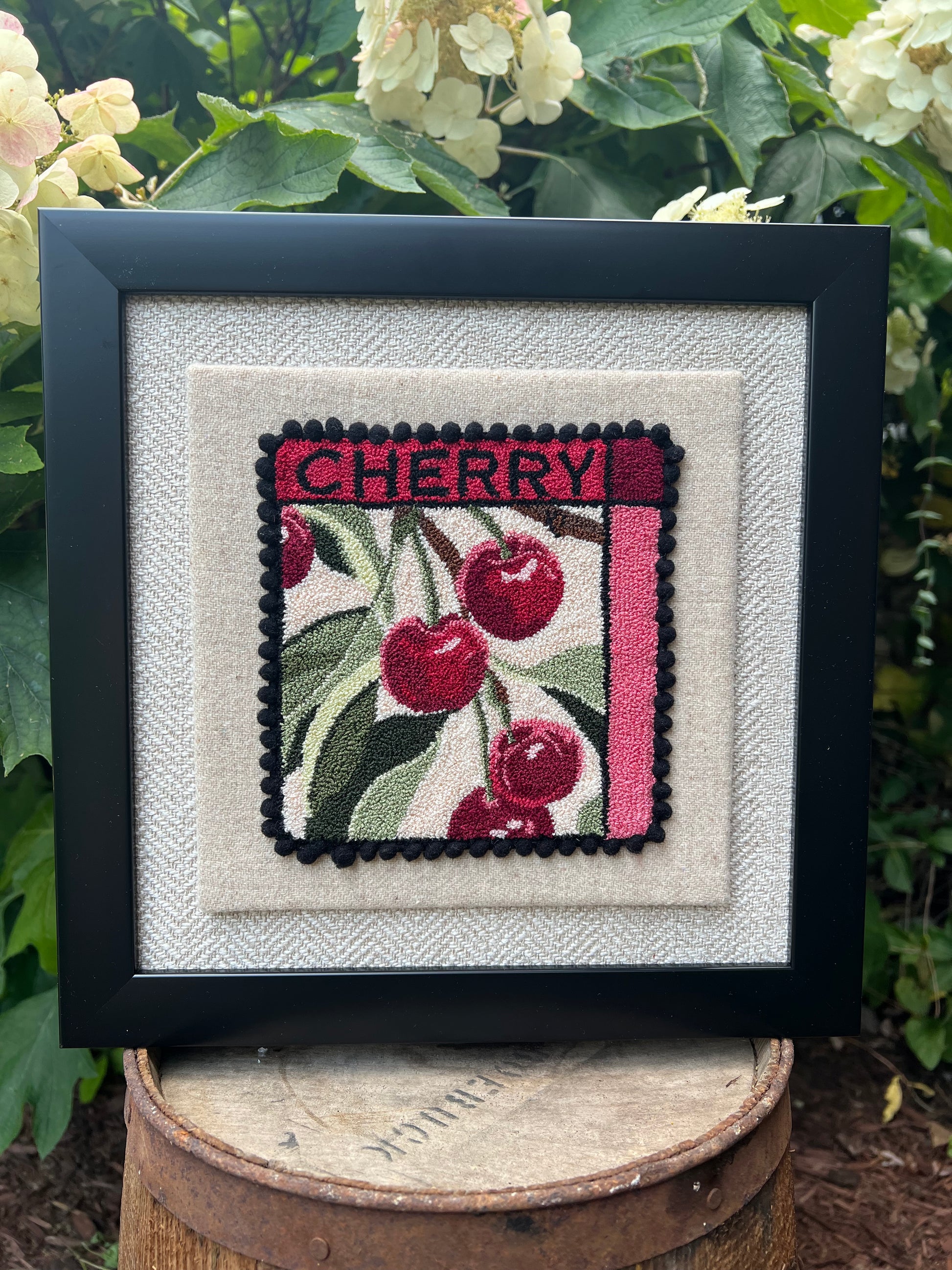 Cherry - PDF Punch Needle Digital Download Pattern by Orphaned Wool, Copyright 2025 Kelly Kanyok. This pattern features a cluster of cherries hanging from a vine with the word "CHERRY" at the top. 