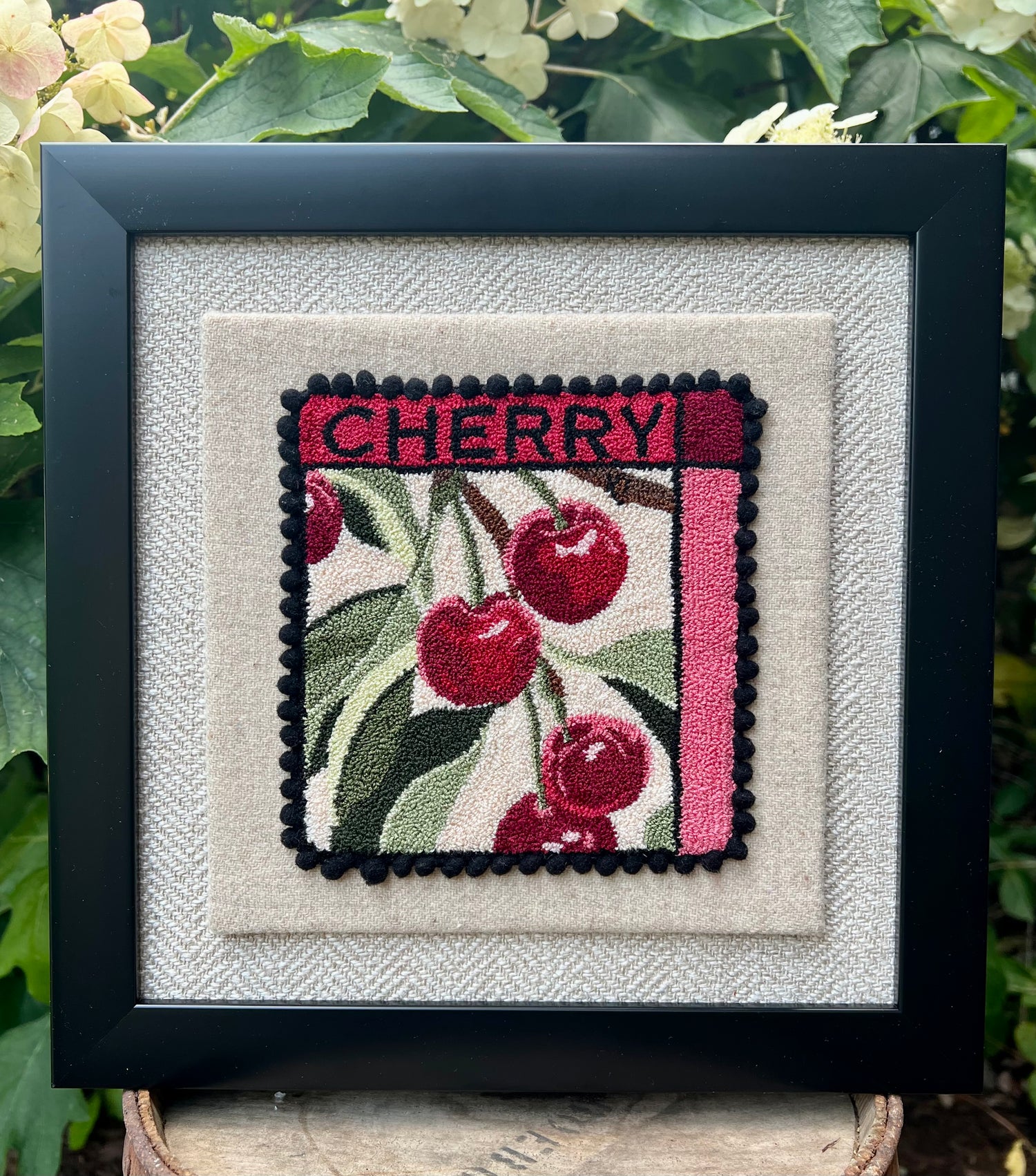Cherry - PDF Punch Needle Digital Download Pattern by Orphaned Wool, Copyright 2025 Kelly Kanyok. This pattern features a cluster of cherries hanging from a vine with the word "CHERRY" at the top. 