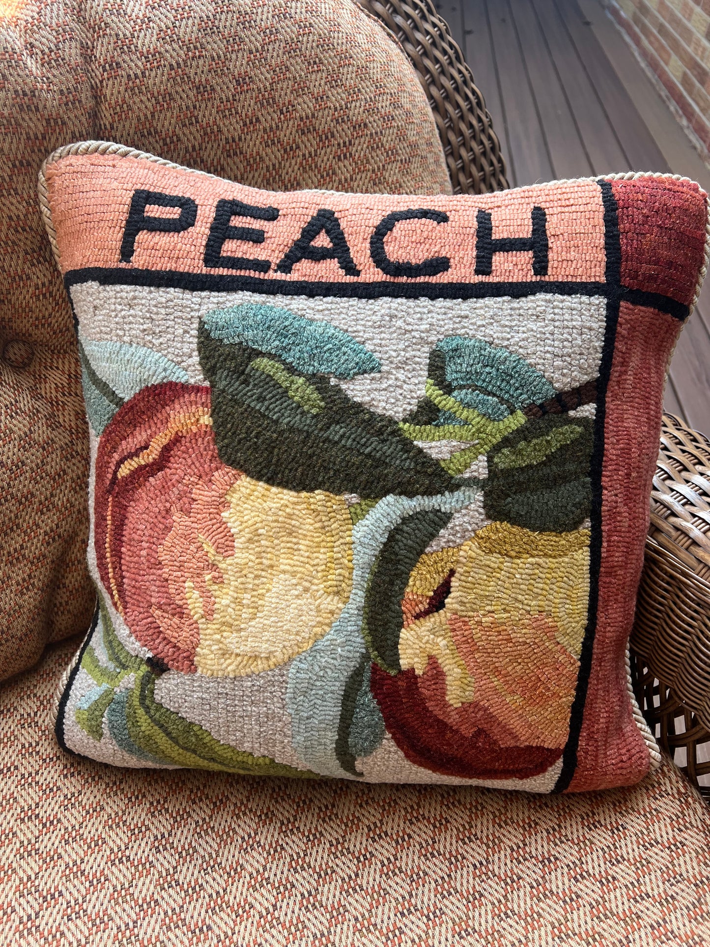 Peach -Rug Hooking pattern by Orphaned Wool, copyright © 2025 Kelly Kanyok. This pattern is part of the Fruit Themed pattern series. The design was enlarged 300% to create this wonderful pillow design. All rights reserved.