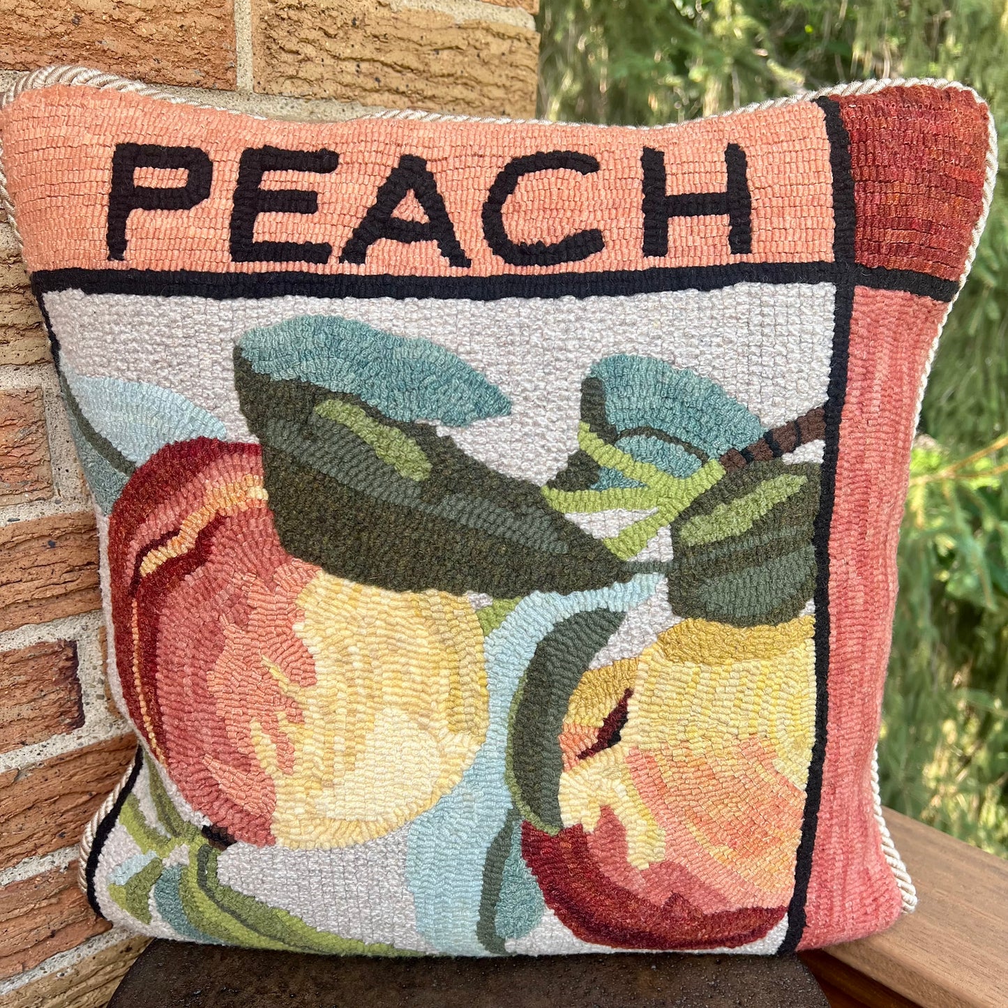 Peach -Rug Hooking pattern by Orphaned Wool, copyright © 2025 Kelly Kanyok. This pattern is part of the Fruit Themed pattern series. The design was enlarged 300% to create this wonderful pillow design. All rights reserved.