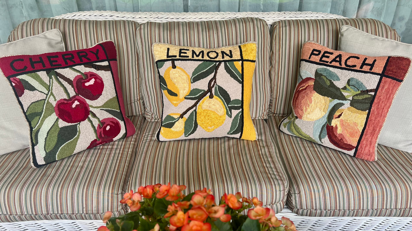 This rug hooking pattern by Orphaned Wool, copyright © 2025 Kelly Kanyok. This paper pattern is designed to be enlarged. This picture shows the finished design enlarged 300% to create a beautiful pillow. Each design features the name of the fruit on top. This pattern is one of four fruit patterns available. Sold individually or as a set of four. Lemon, Lime, Peach, and Cherry designs.