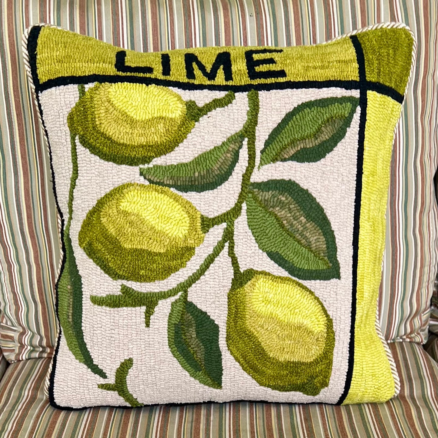 Featuring the Lime design rug hooked pillow by Orphaned Wool copyright Kelly Kanyok 2025. 