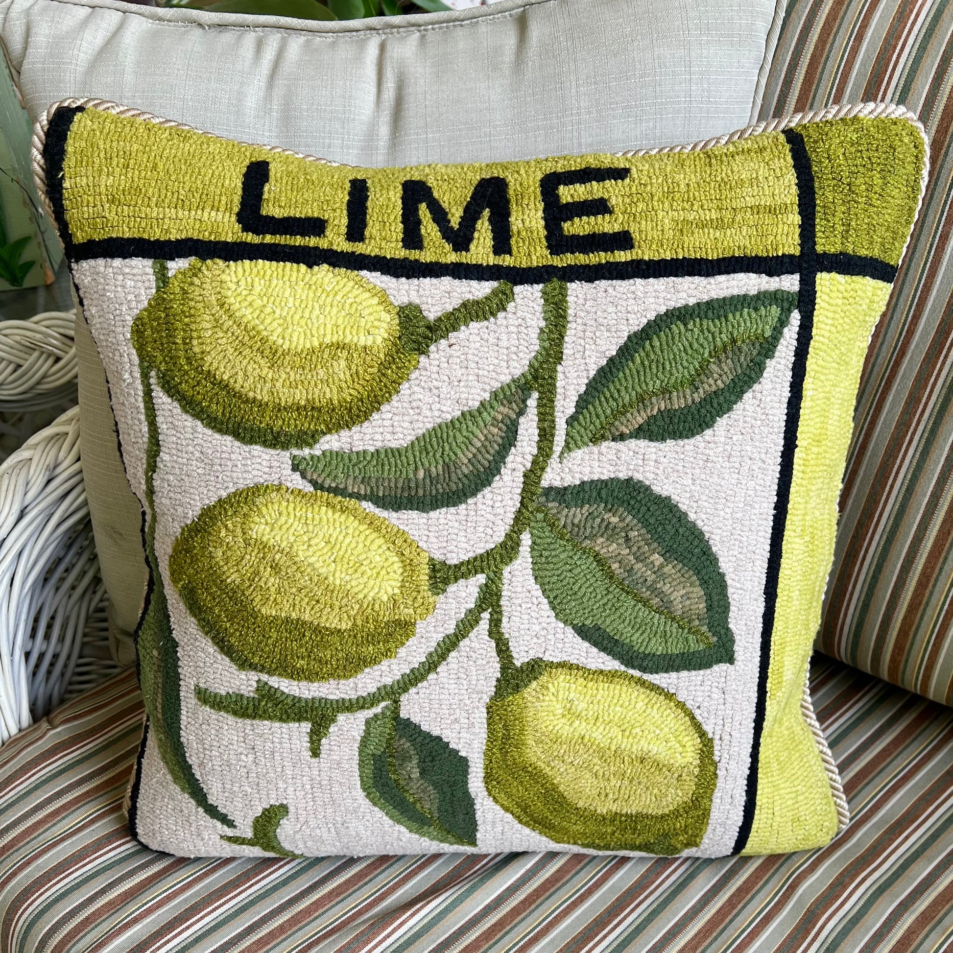 Featuring the Lime design rug hooked pillow by Orphaned Wool copyright Kelly Kanyok 2025. 