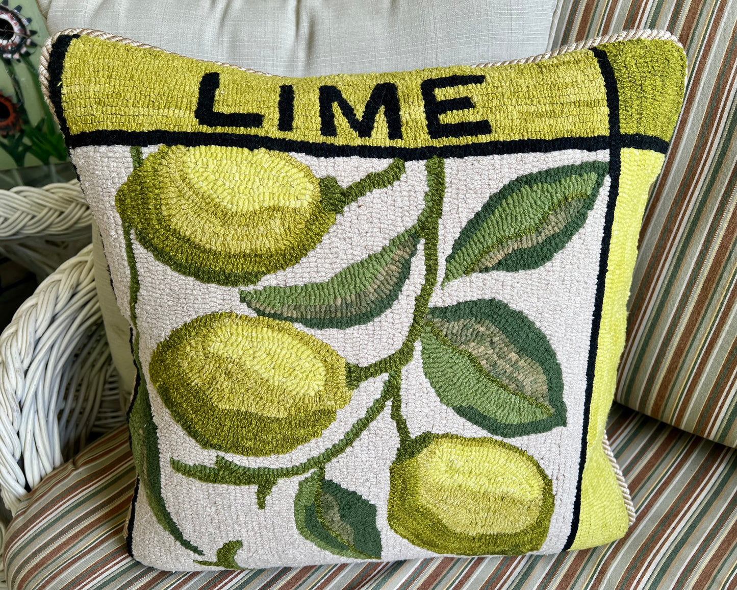 Featuring the Lime design rug hooked pillow by Orphaned Wool copyright Kelly Kanyok 2025. 