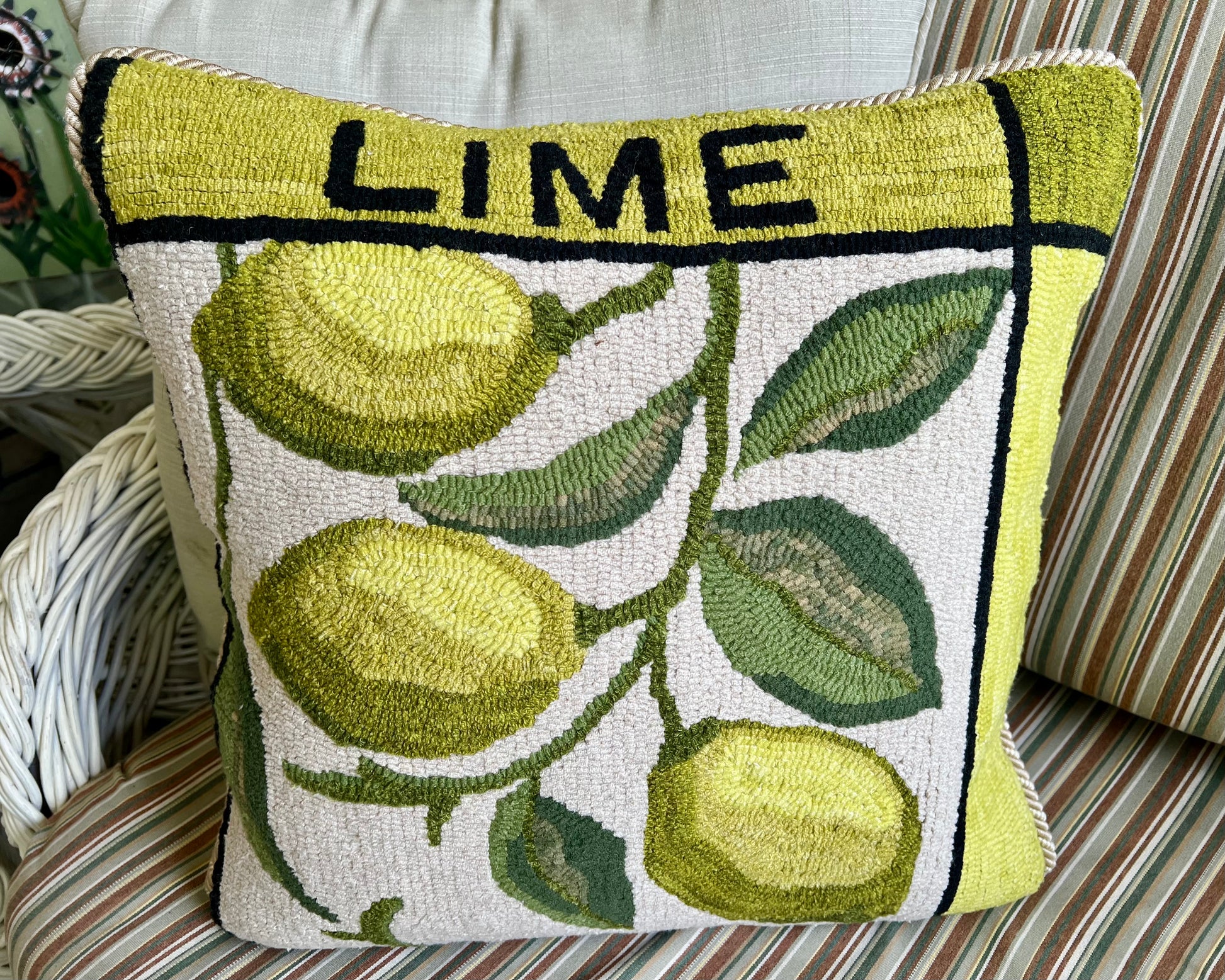 Featuring the Lime design rug hooked pillow by Orphaned Wool copyright Kelly Kanyok 2025. 