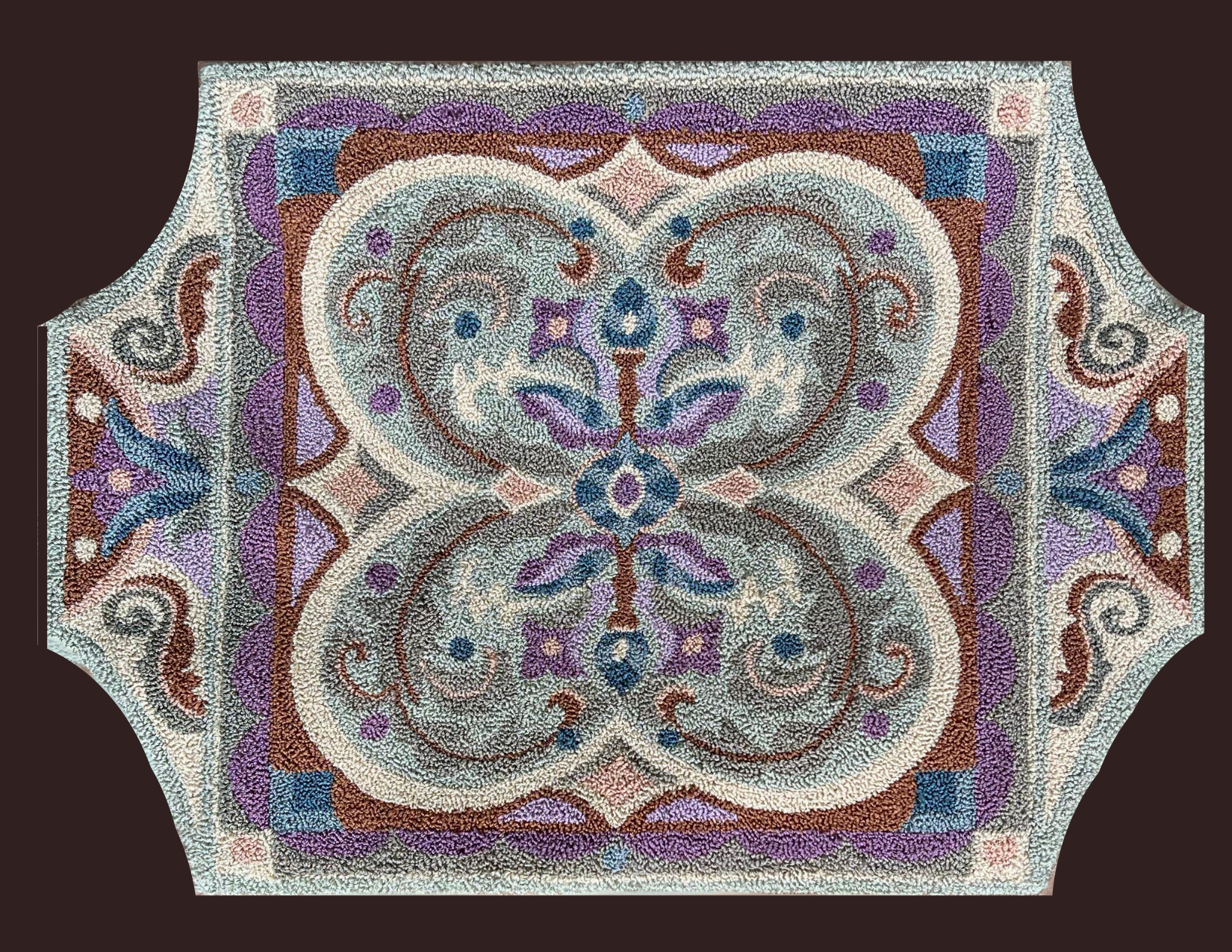 Misty Lavender- Rug Hooking Paper Pattern by Orphaned Wool. This is a beautifully designed intricate design using lavender and soft hue colors to create a stunning designed hooked rug. Copyright 2023 Kelly Kanyok