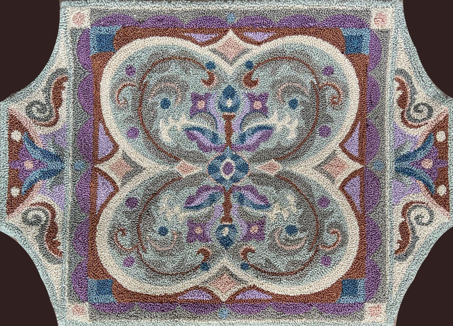  Misty Lavender- Rug Hooking Paper Pattern by Orphaned Wool. This is a beautifully designed intricate design using lavender and soft hue colors to create a stunning designed hooked rug. Copyright 2023 Kelly Kanyok