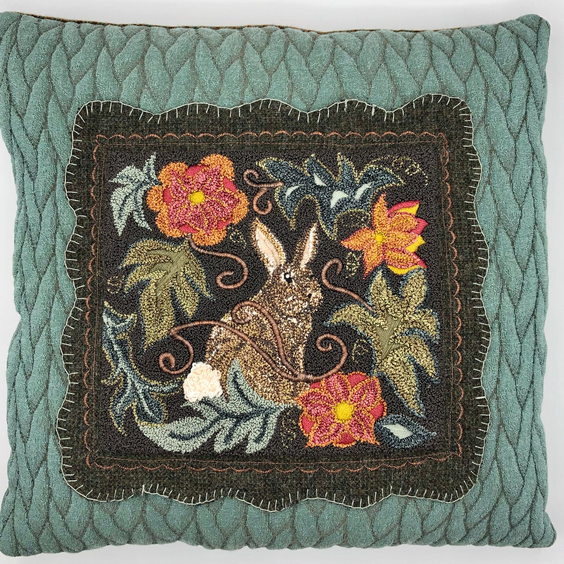Garden Rabbit Punch Needle pattern by Orphaned Wool. Design can be finished using Valdani Threads or Dmc Floss. Beautiful  Garden Rabbit pattern with flowers and leaves. A lovely pillow design.
