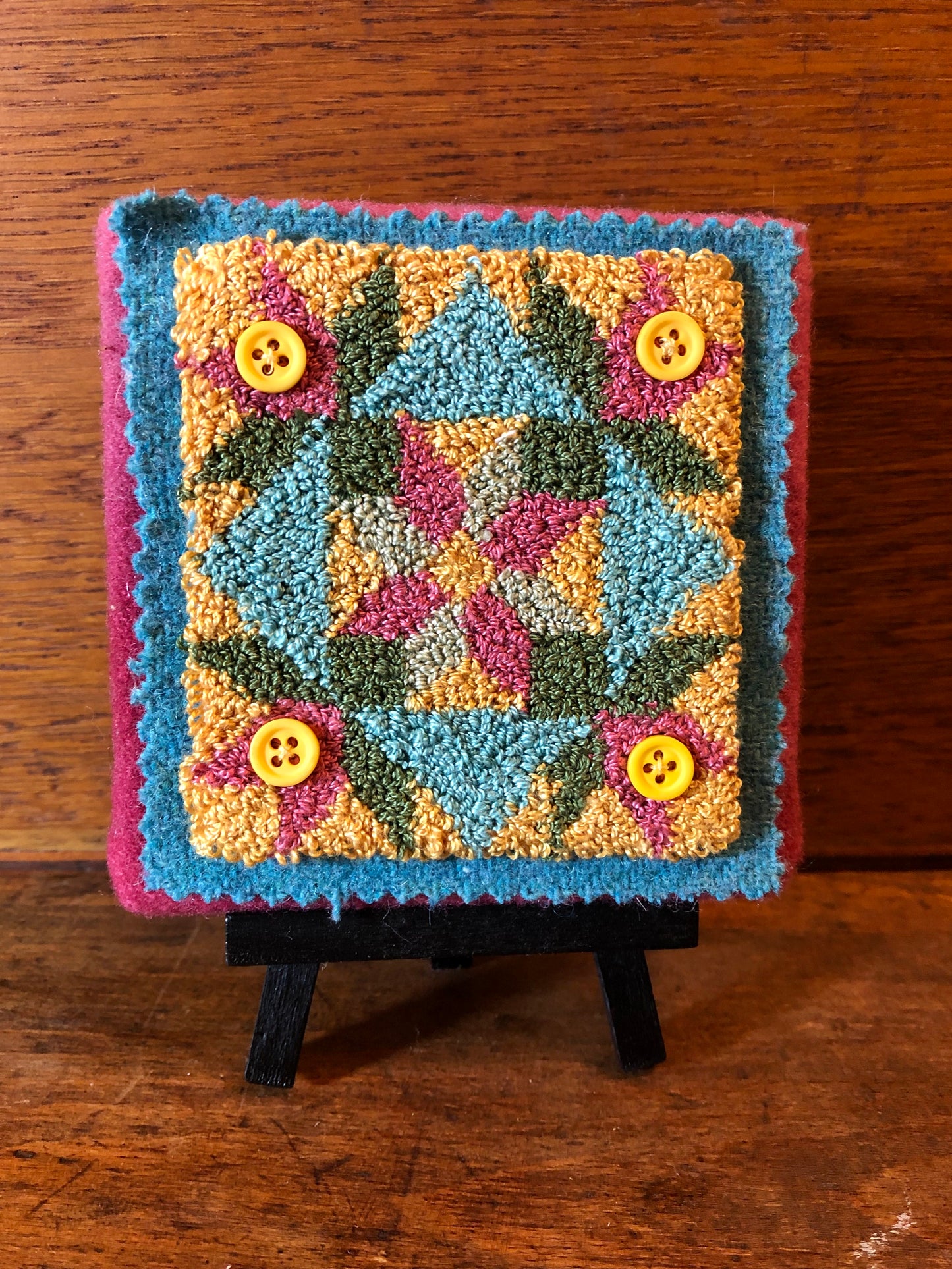 This Mini Flower Punch Needle Pattern includes the paper pattern along with the pattern of weavers cloth fabric, by Orphaned Wool.