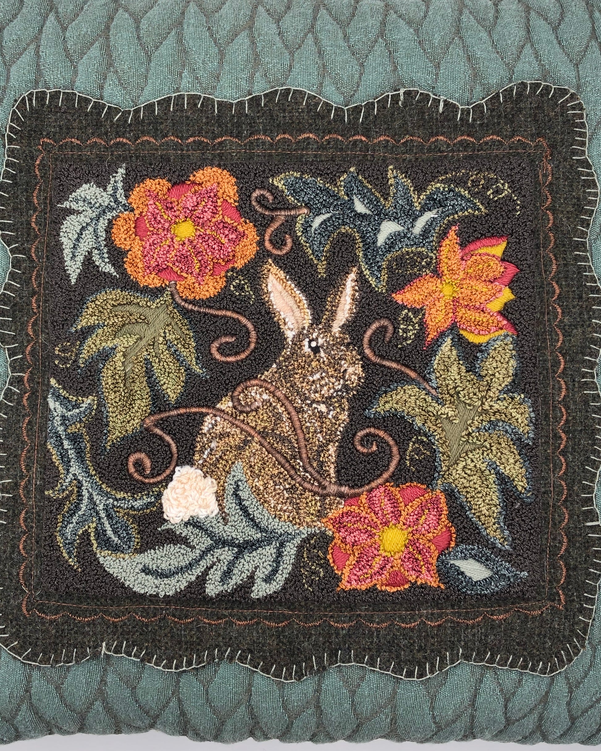 Garden Rabbit Punch Needle pattern by Orphaned Wool. Design can be finished using Valdani Threads or Dmc Floss. Beautiful Garden Rabbit pattern with flowers and leaves. A lovely pillow design.