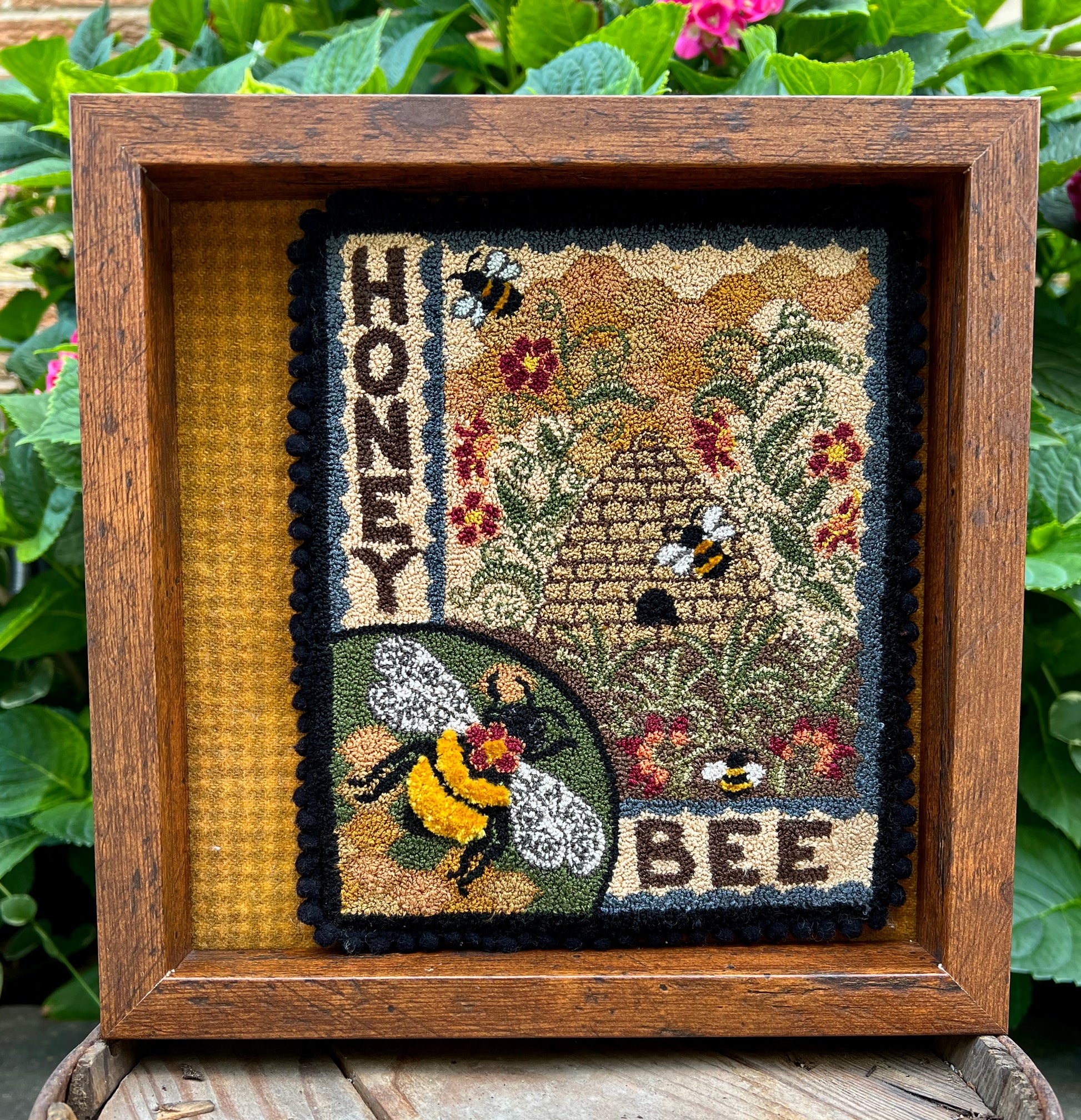 Honey Bee Punch Needle Pattern by Orphaned Wool is a wonderful pattern for all the bee lovers out there. This design can be completed using DMC Floss. The sweet bumblebees and bee skep with the honeycomb and flowers is a delightful pattern to create. Pattern are available as Paper Patterns and Pattern on Weavers Cloth.