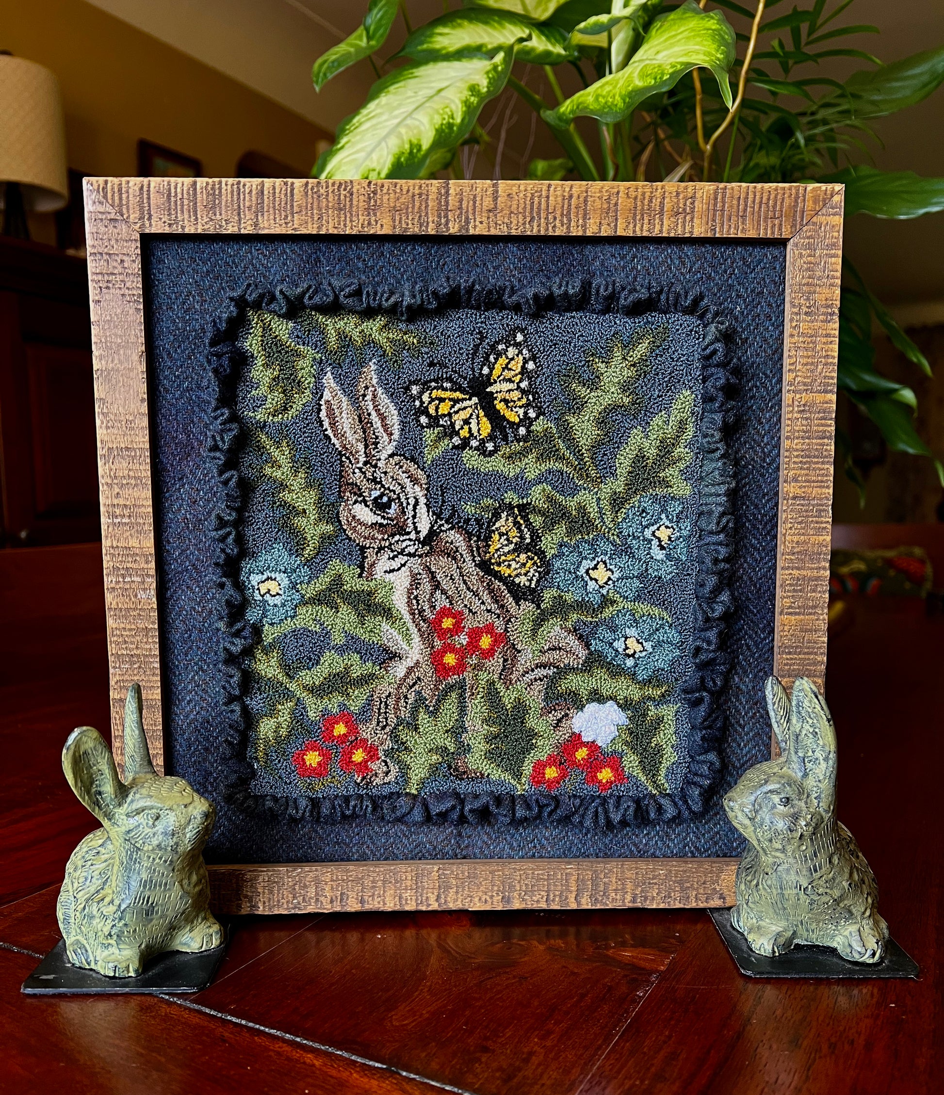 Hare with Friends PDF Digital Download Punch Needle Pattern by Orphaned Wool. This design is for anyone that loves bunnies and butterflies. This bunny is nestled in with flowers and foliage. makes a stunning finished design. DMC Floss was used in pattern.